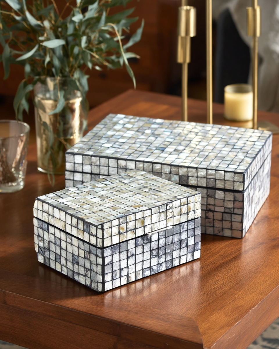 Two rectangular mother-of-pearl shell mosaic decorative boxes, one large and one small, stacked together